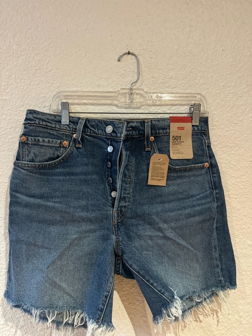 Levi's Denim Cutoff Jean Shorts in Medium Blue Wash mid thigh style (30) - Picture 3 of 5